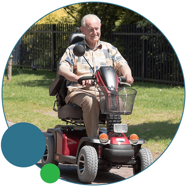 person on power scooter outside