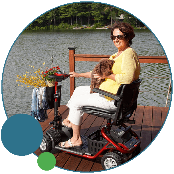 lady by the lake in a scooter